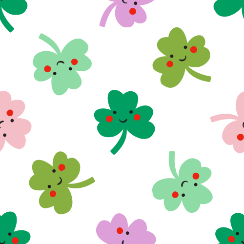 Pink, purple, shades of green tossed clovers with smiley faces