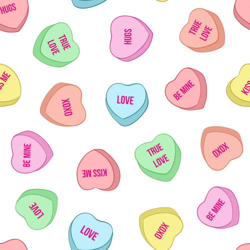 Cute tossed Valentine's Day candy hearts in various colours