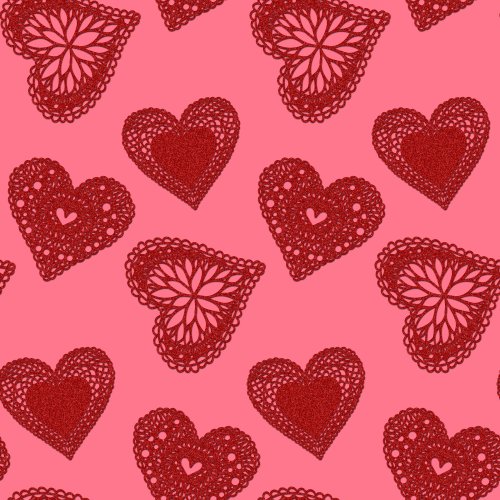 red glitter hearts on a pink background