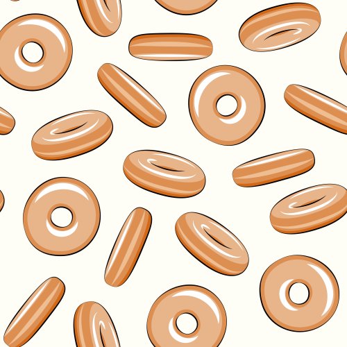 Glazed donuts tossed on a cream background. 