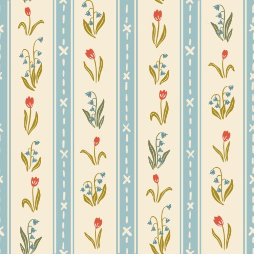 Vertical stripe pattern featuring alternating pale blue stitched ticking stripes and delicate spring florals with tulips and leafy stems in soft coral, yellow, green, and blue on a warm cream background, inspired by vintage textiles and handmade quilts.