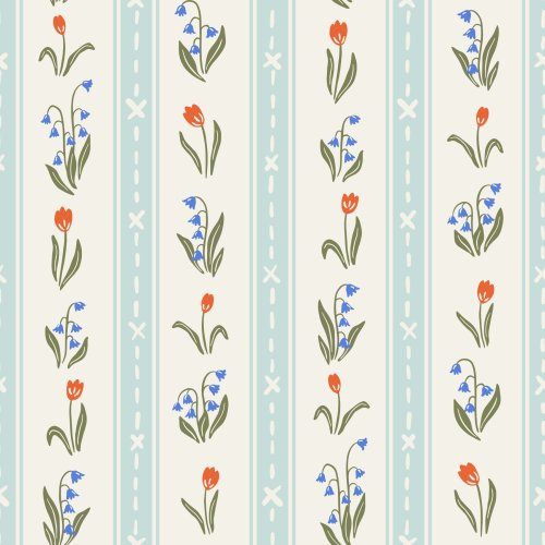 Vertical stripe pattern featuring alternating pale blue stitched ticking stripes and delicate spring florals with tulips and leafy stems in soft coral, yellow, green, and blue on a warm cream background, inspired by vintage textiles and handmade quilts