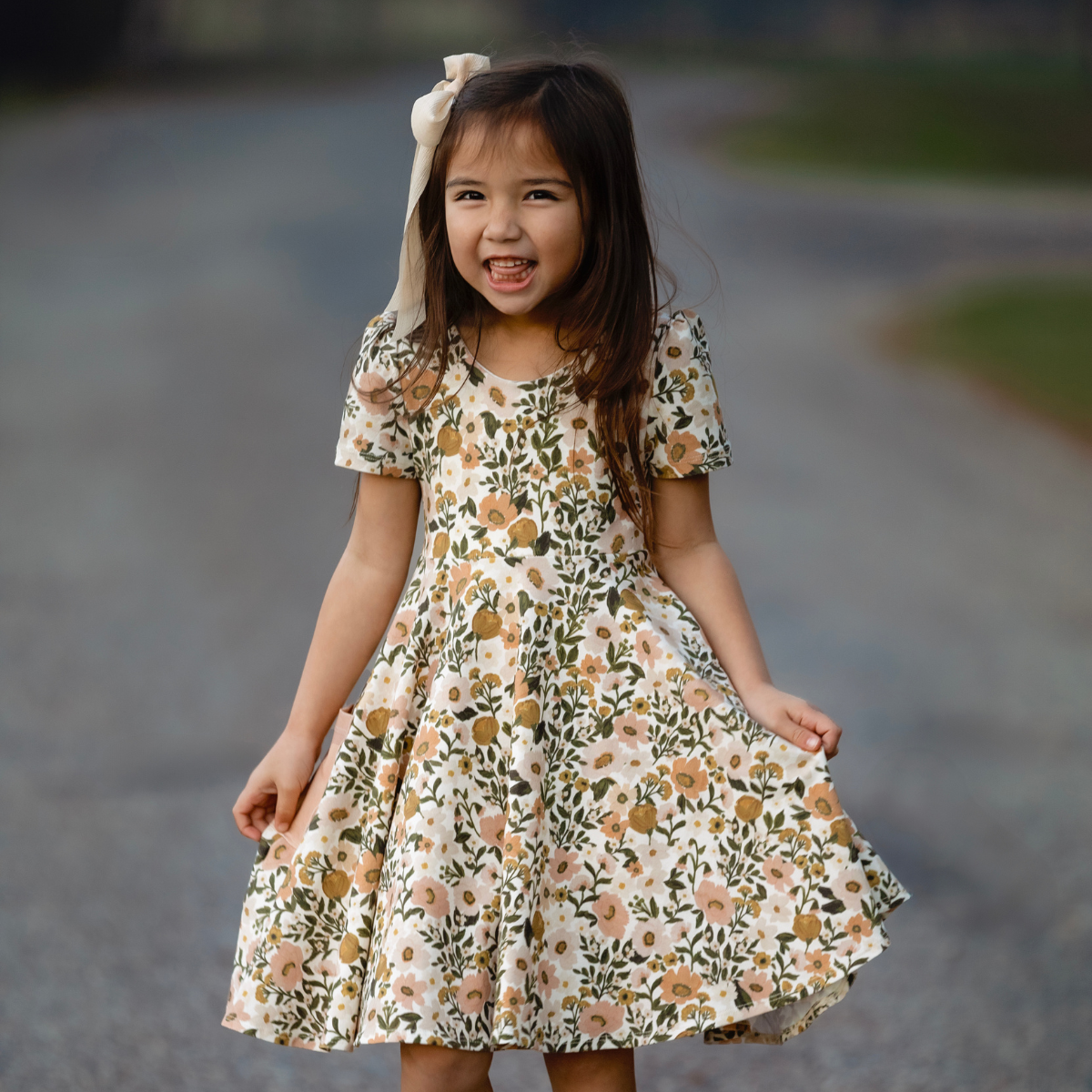 girls dress featuring indy bloom design floral fabric